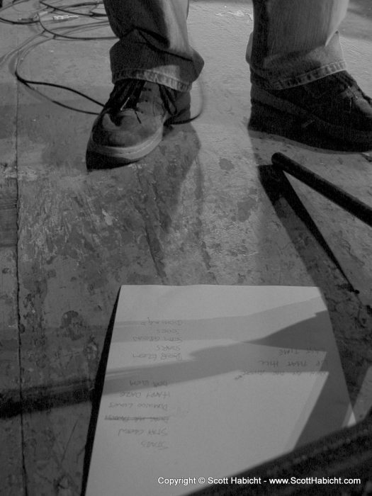 A quick check of the setlist before starting.