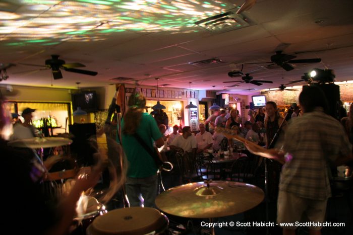 It was getting late, but the bar was still packed.