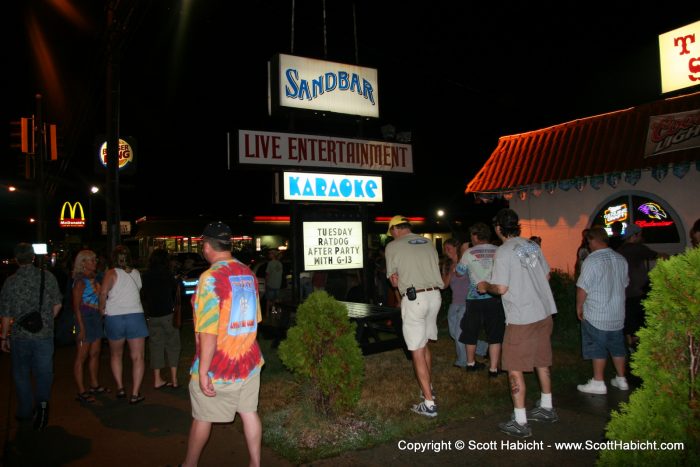 As the crowd stumbled out the door.....