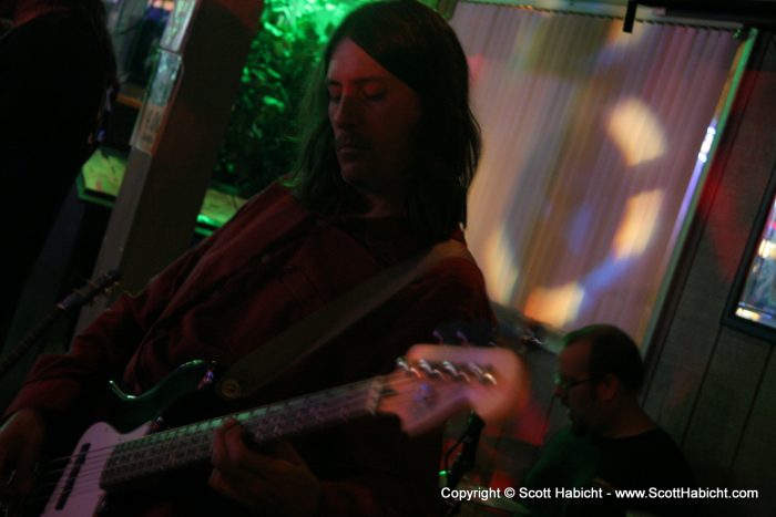 John Sybert, bass guitar.