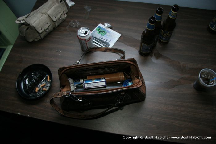 Some dame left her purse open, so I figured I'd take a picture for eveyone to see what she has inside.