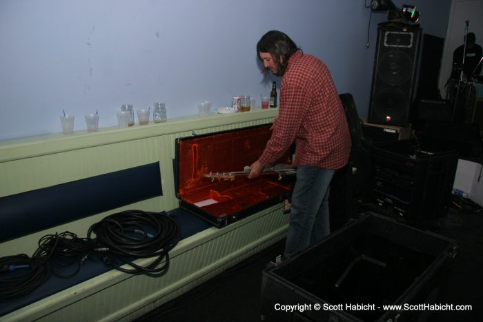 John puts his bass to bed for the night.