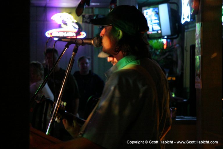 John Sybert, bass guitar and vocals.