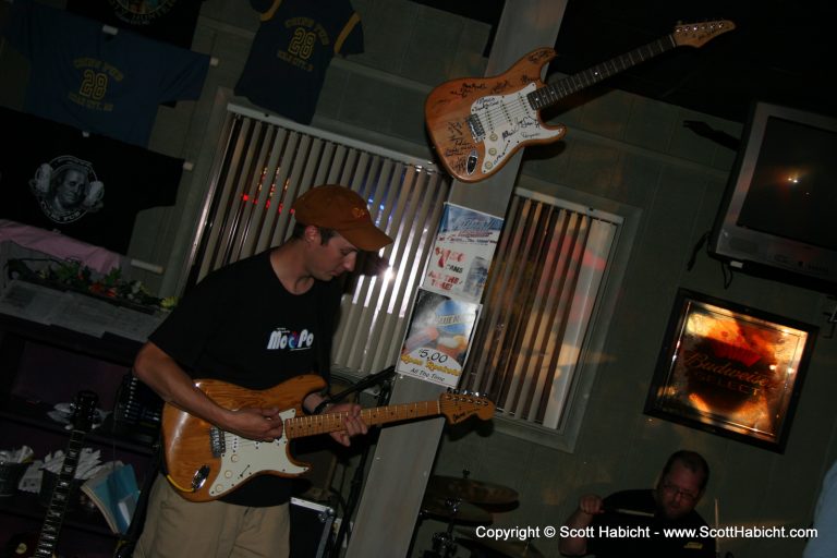 Jason Shegouge, lead guitar. He used to own the guitar mounted above....
